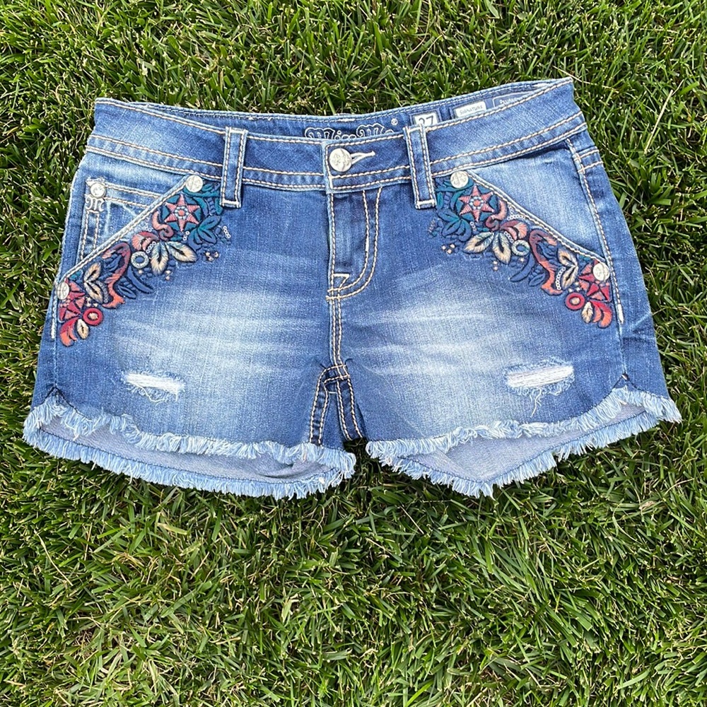 Miss Me denim short size 27 and 10” from waist to short frayed edge.